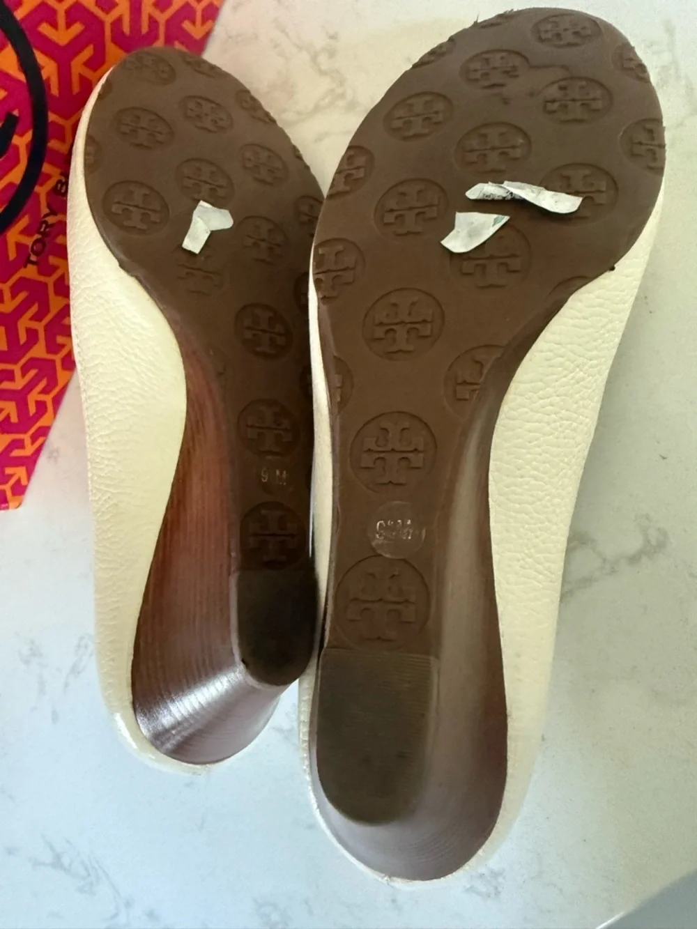 Tory Burch Ivory Textured Leather Wedge Pumps with Logo Medallion - Picture 3 of 6